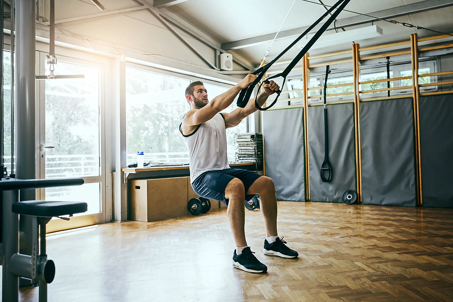 TRX-Suspension-Curl Build Your Stronghold: Unfolding the Strength of Back & Bicep Workouts